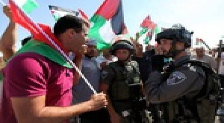 نشطاء المقاومة الشعبية يمنعون البناء على أراضي العيزرية وأبو ديس
