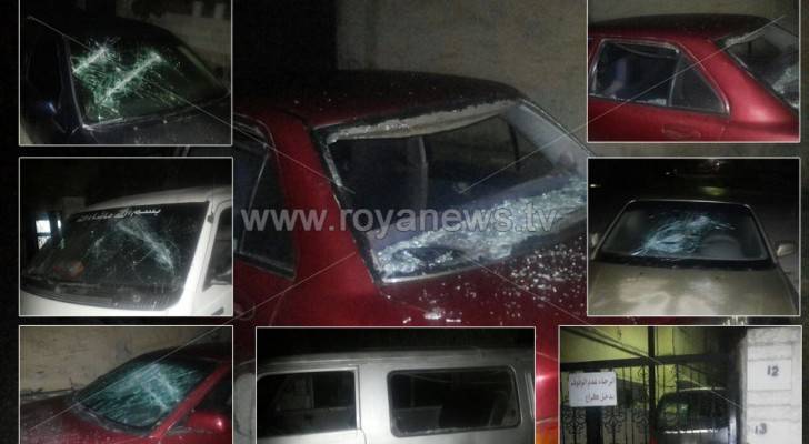 بالصور : هجوم على منازل وتحطيم زجاج 15 مركبة في إربد