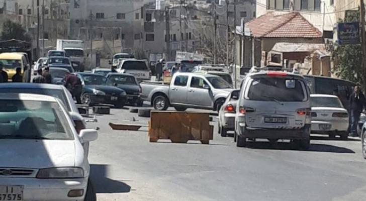 الأمن يتعامل مع أعمال شغب في خريبة السوق جنوب عمان ..صور