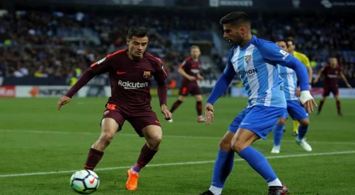 برشلونة يفوز على ملقا ويعزز صدارته للدوري الإسباني