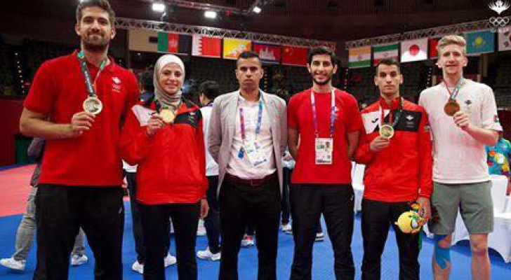 استقبال جماهيري كبير لمنتخب التايكواندو بعد انجاز الاسياد