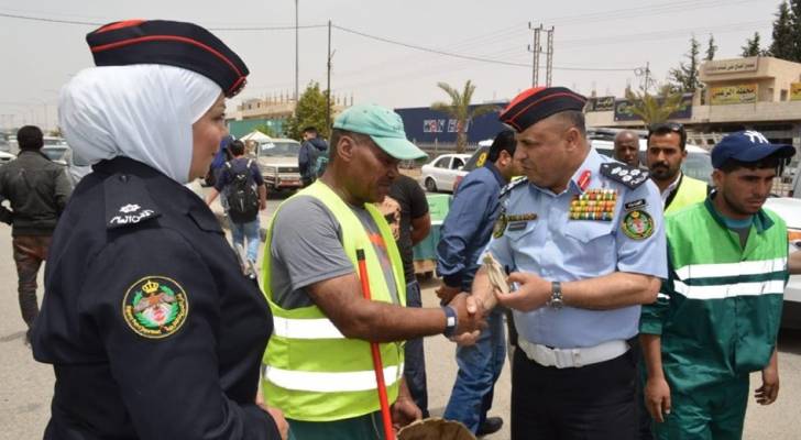 "الأمن العام" تشارك عمال الوطن احتفالهم بالعيد- صور