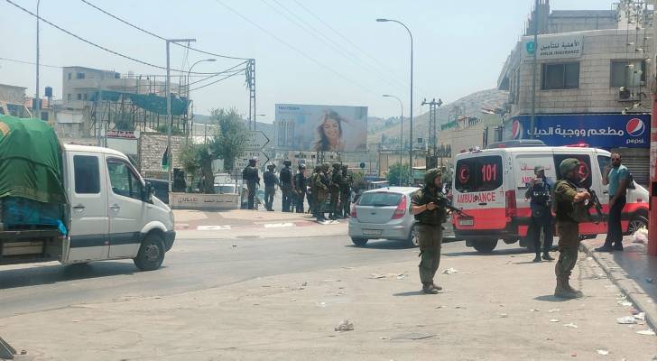 إصابتان في قمع الاحتلال شبانا يرفعون العلم الفلسطيني في حوارة