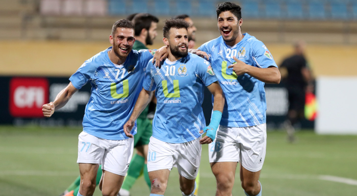 لاعبو الفيصلي يحتفلون بهدف سابق