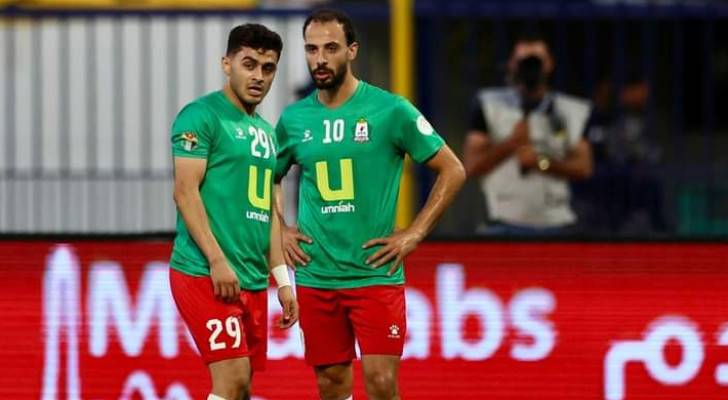 لاعبا نادي الوحدات صالح راتب ومحمد أبو زريق