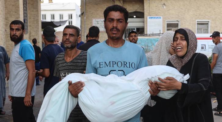 جثمان أحد الشهداء بمستشفى المعمداني بغزة