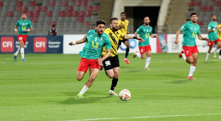 من مباراة سابقة بين الوحدات والحسين