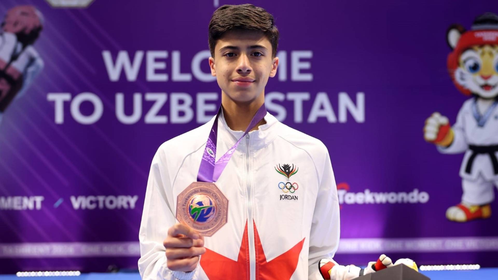 عبدالله شاهين يطوق عنقه بالبرونز في بطولة العالم للتايكواندو