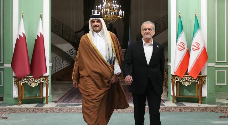 صورة تجمع أمير قطر والرئيس الإيراني