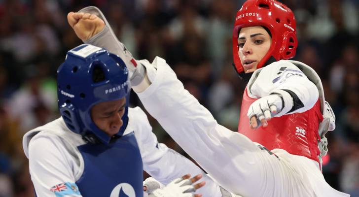 Julyana Al-Sadeq reaches taekwondo Olympic quarterfinals