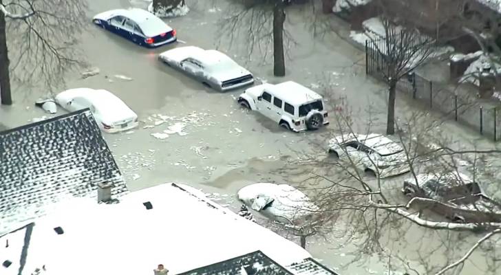 VIDEO - Detroit cars left encased in ice after massive water leak