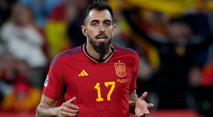 Spanish footballer Borja Iglesias applauds fans raising Palestinian flags during matches