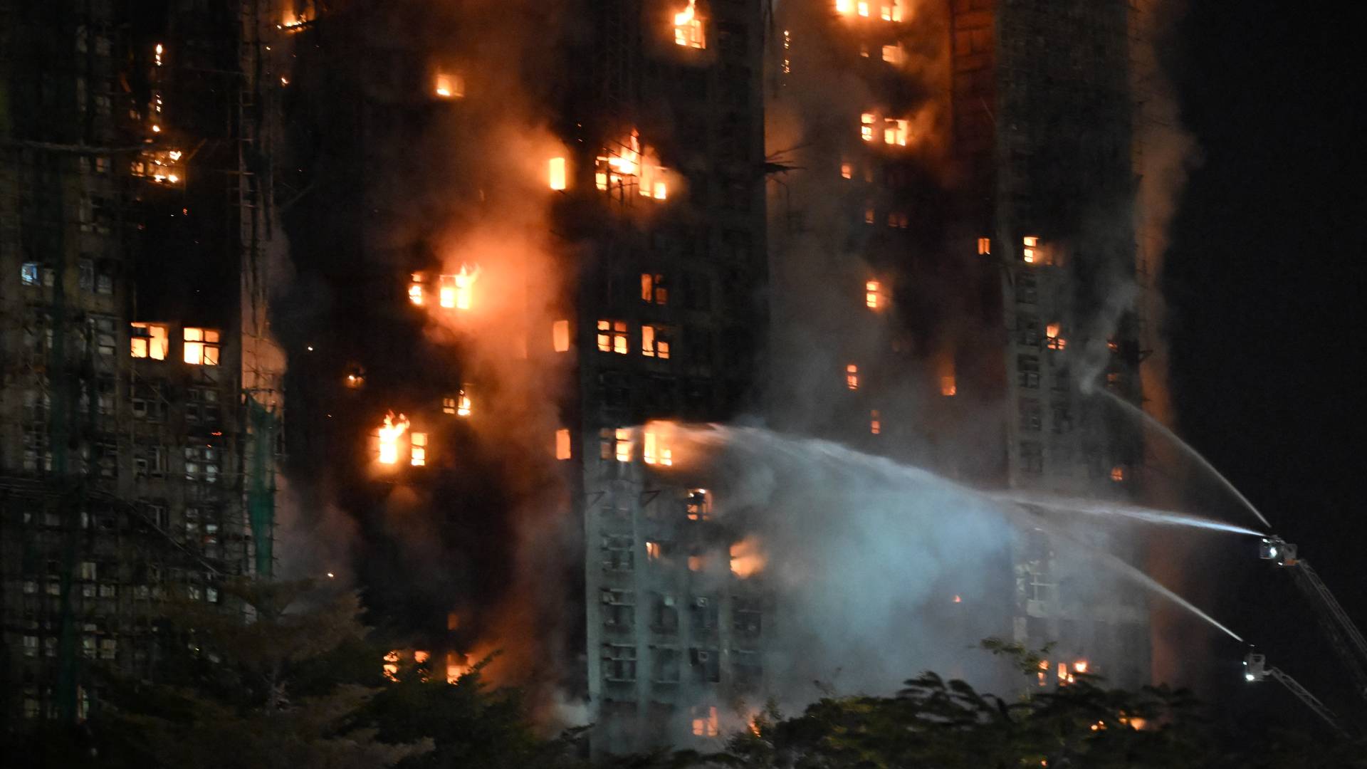 Massive fire engulfs Hong Kong high-rises, killing 13