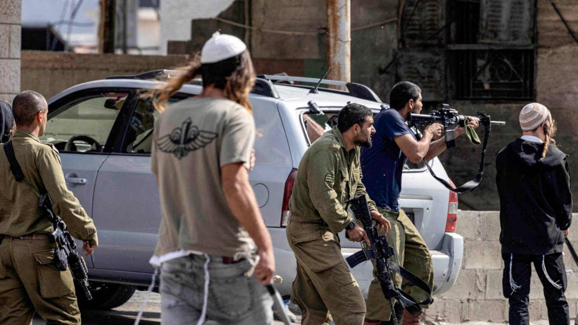 'Israeli' settlers, forces assault family, demolish home