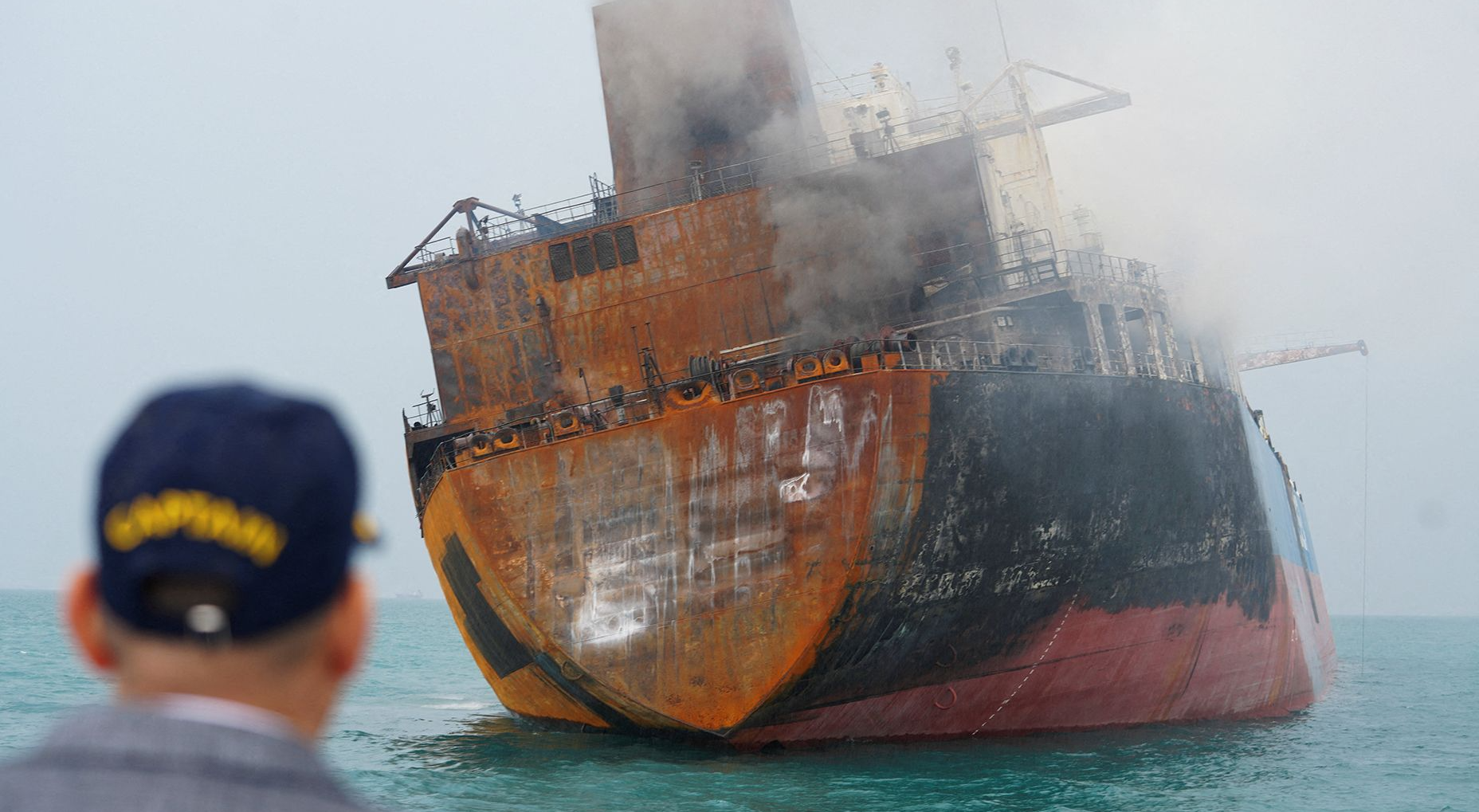 Vessel set ablaze off Oman after projectile strike in Hormuz