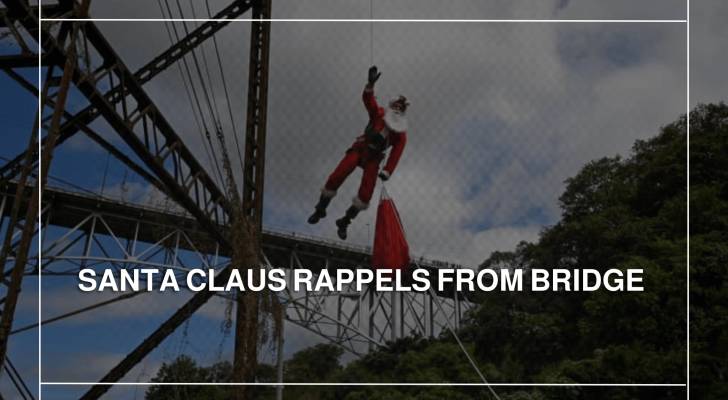 Santa Claus rappels from bridge to bring joy to Guatemalan children