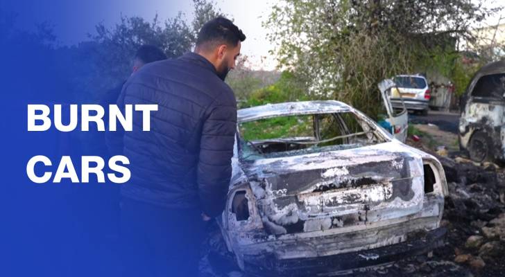 Palestinians check cars burnt by settlers in West Bank village