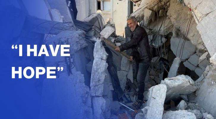 Gazan father digs through rubble to find bodies of his family