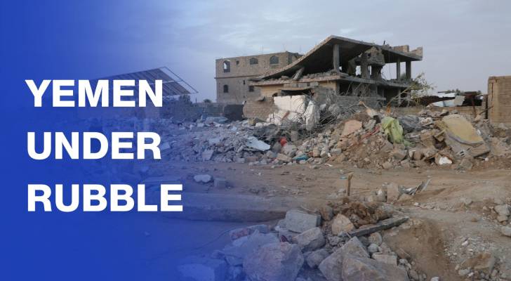 People search the rubble after a US air strike on Saada, northern Yemen