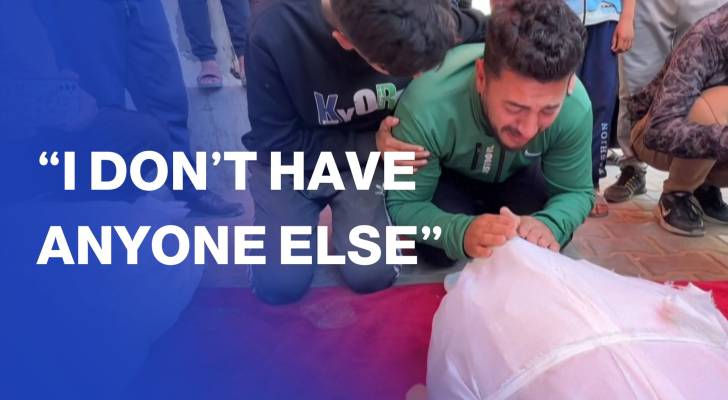 Gazans mourn and pray over bodies at Al-Awda hospital in Nuseirat