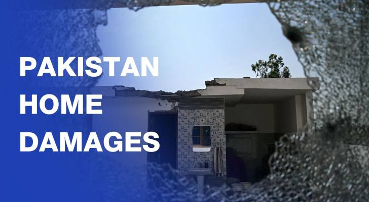 Residents of Jora village remove debris from their damaged homes