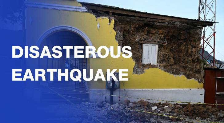 Guatemalans survey earthquake damage after a night sleeping in the street
