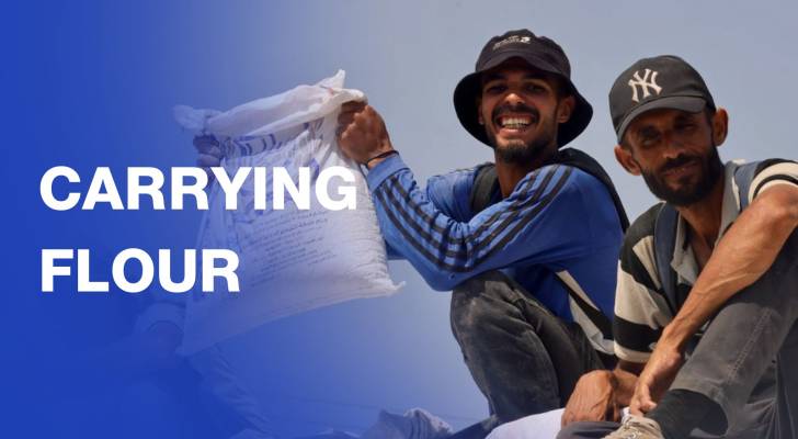 Gaza residents carry flour on their shoulders to feed their hungry families