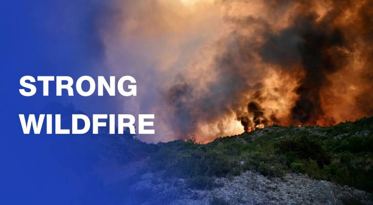 Wildfire forces evacuations, colours sky orange in southern France
