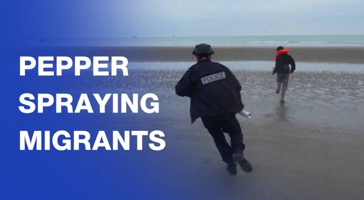 French police try to stop migrants from crossing the English Channel