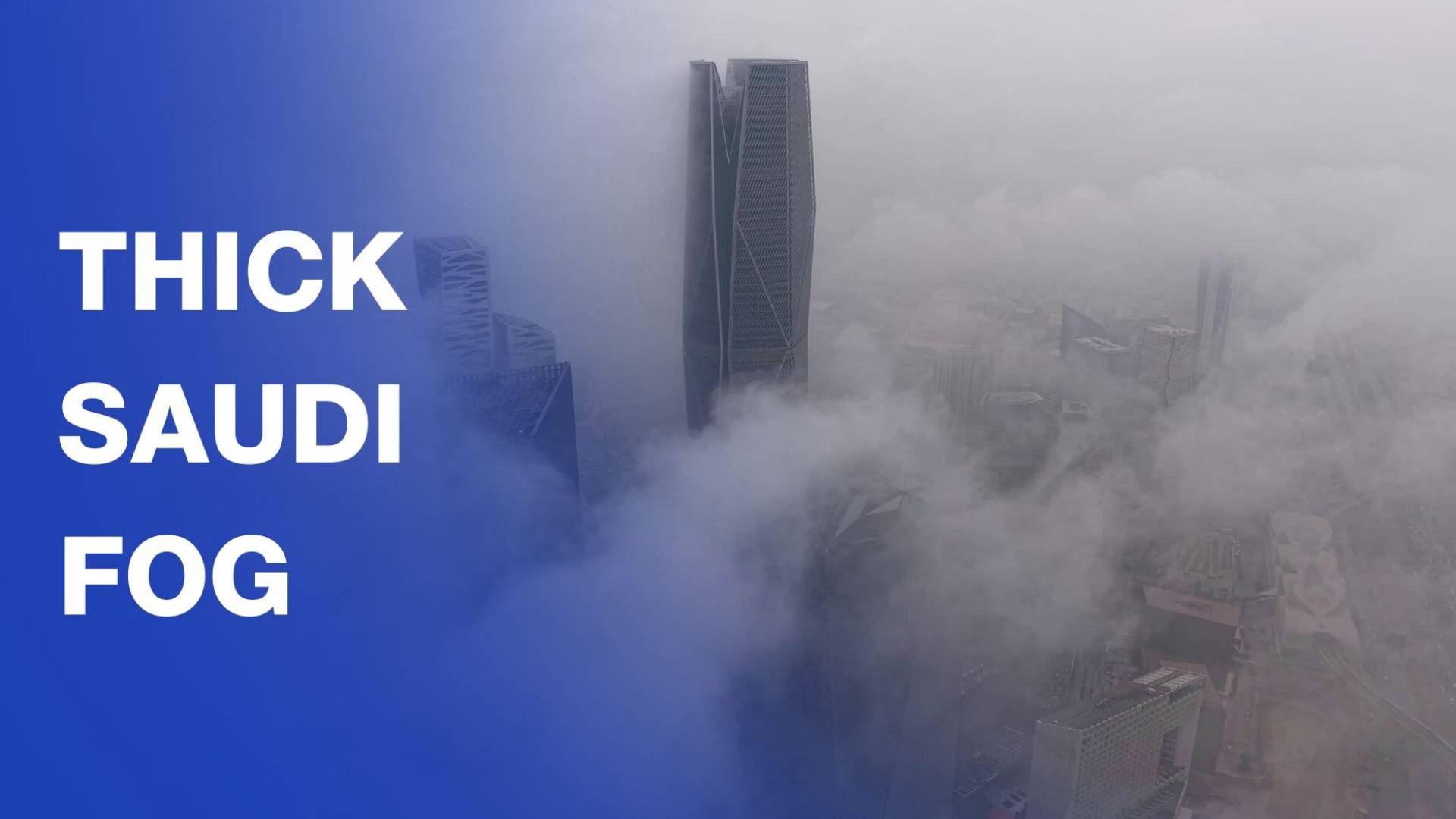 Towers fade in dense fog over Riyadh during storm