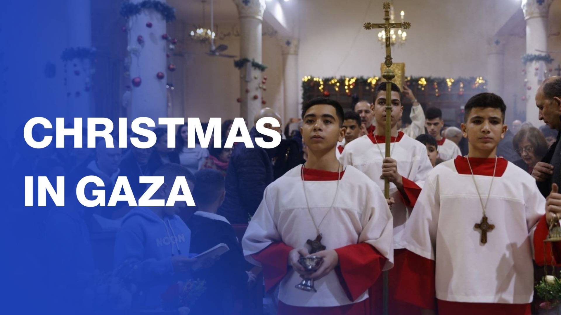Palestinian Christians celebrate Christmas Mass at Holy Family Church