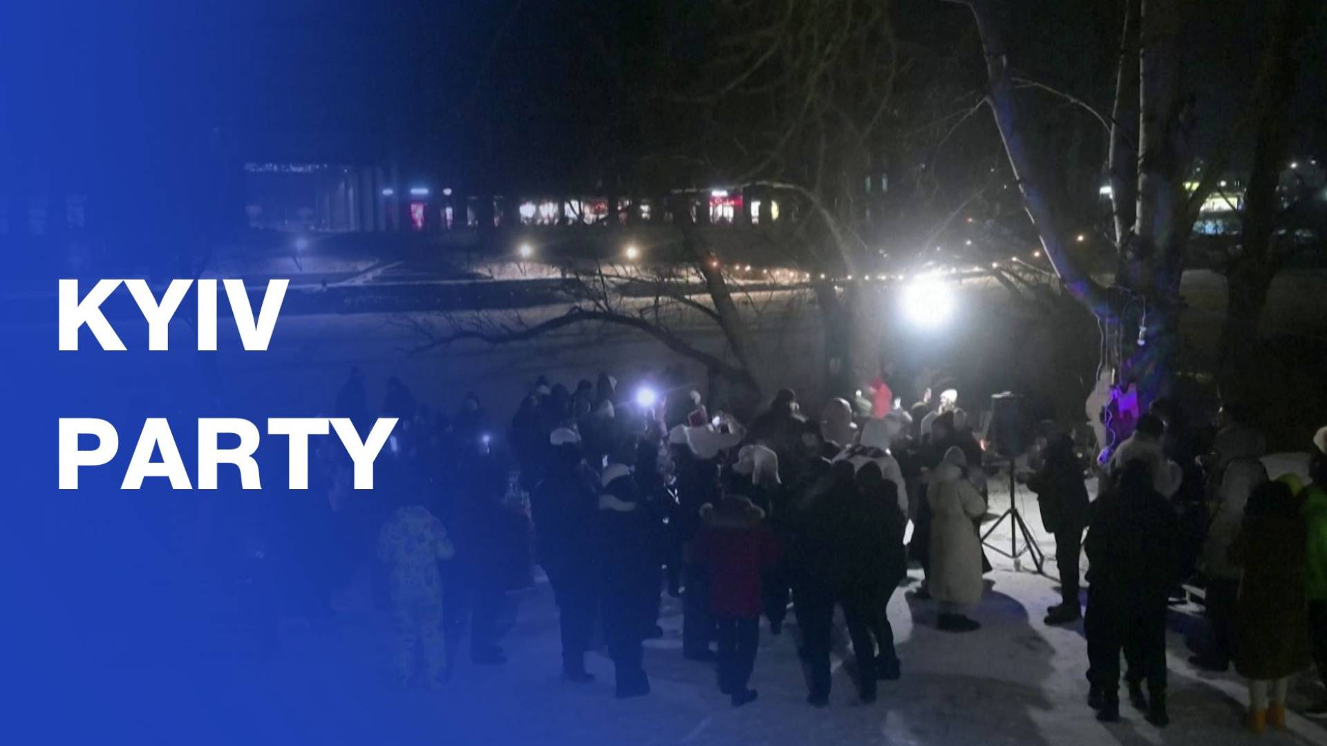 Kyiv residents hold party outside their house during power cuts