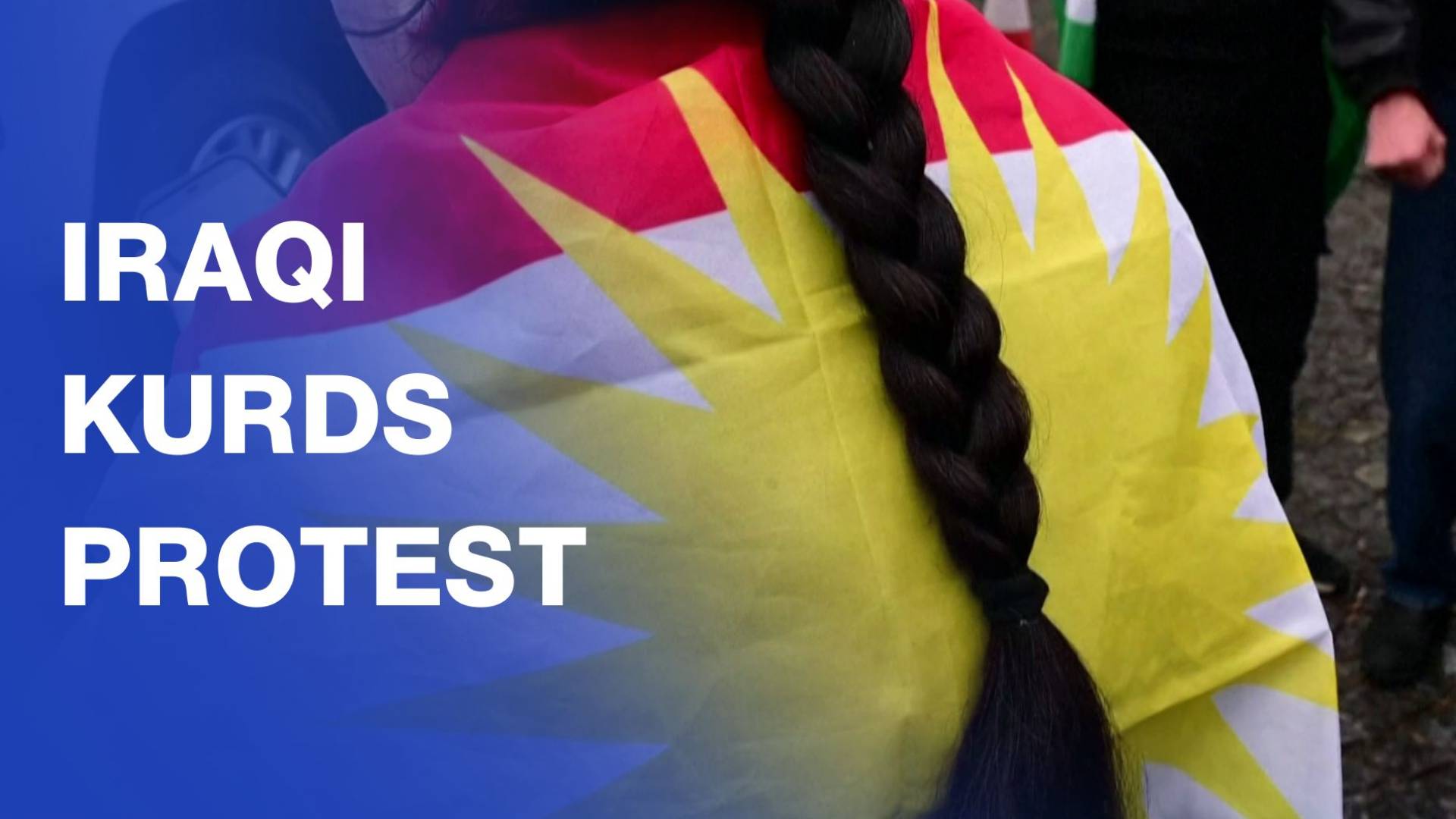 Iraqi Kurdish women braid hair at protest to show solidarity with Syrian Kurds