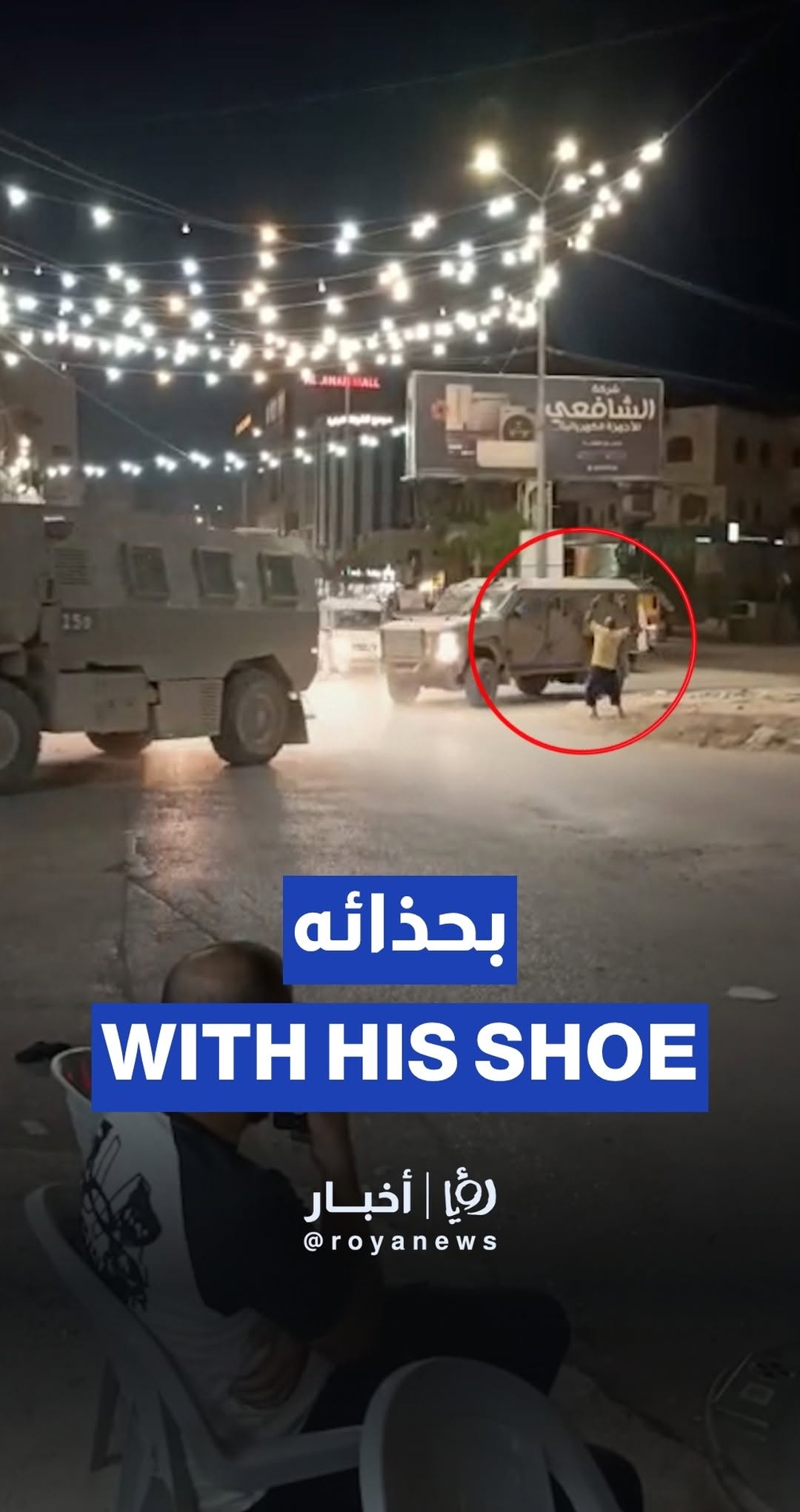 Palestinian confronts “Israeli” vehicles with his shoe in the West Bank