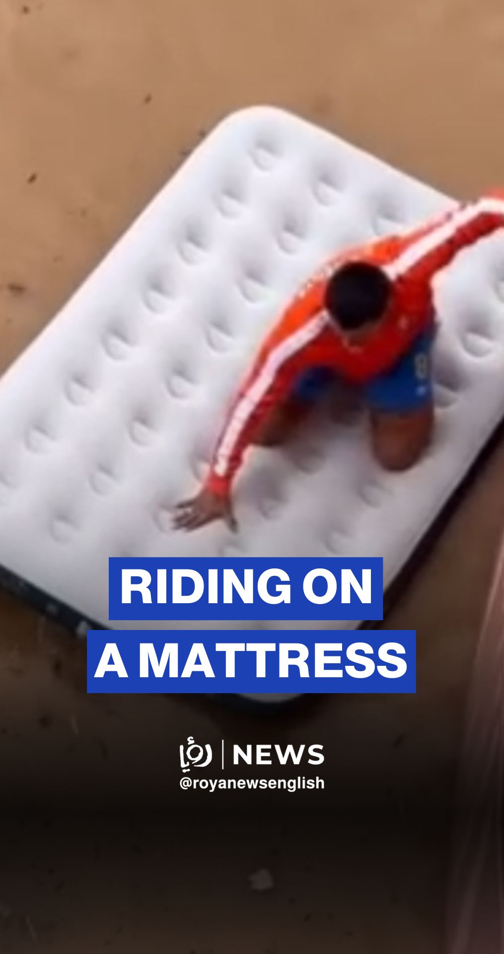 Man rides inflatable mattress along flooded Ibiza street