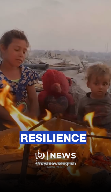 Amid Gaza’s rubble, a father and his children find warmth and hope around a small fire
