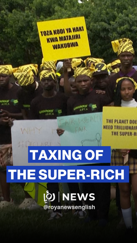 Greenpeace volunteers create giant human Africa map for wealth tax campaign
