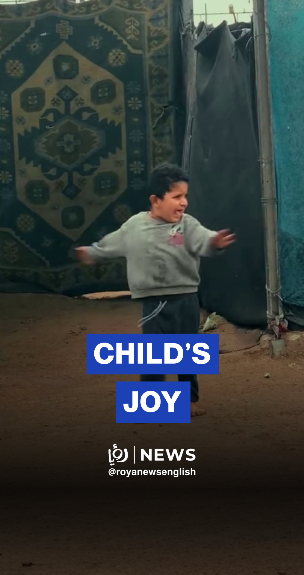 Rain brings joy to a child in Gaza tents