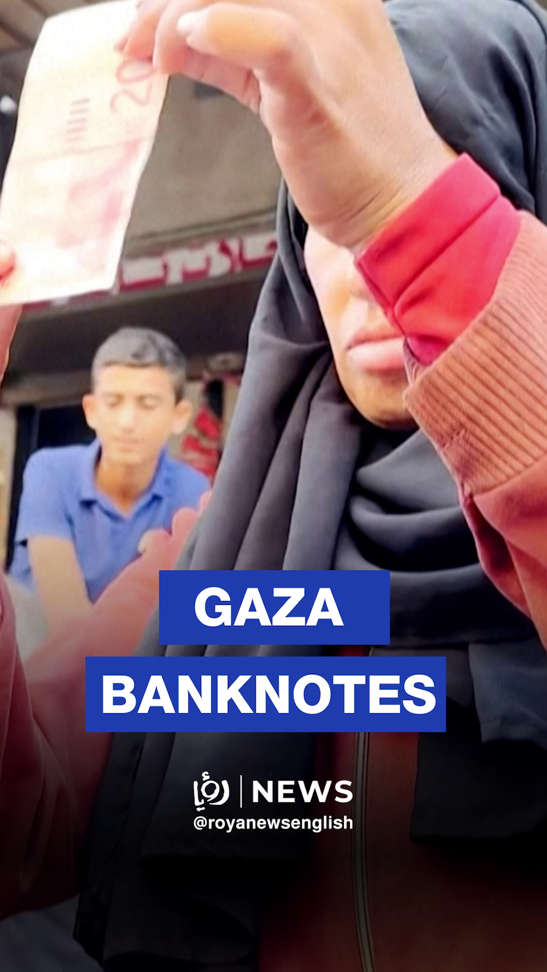 Gaza woman repairs damaged banknotes for a living