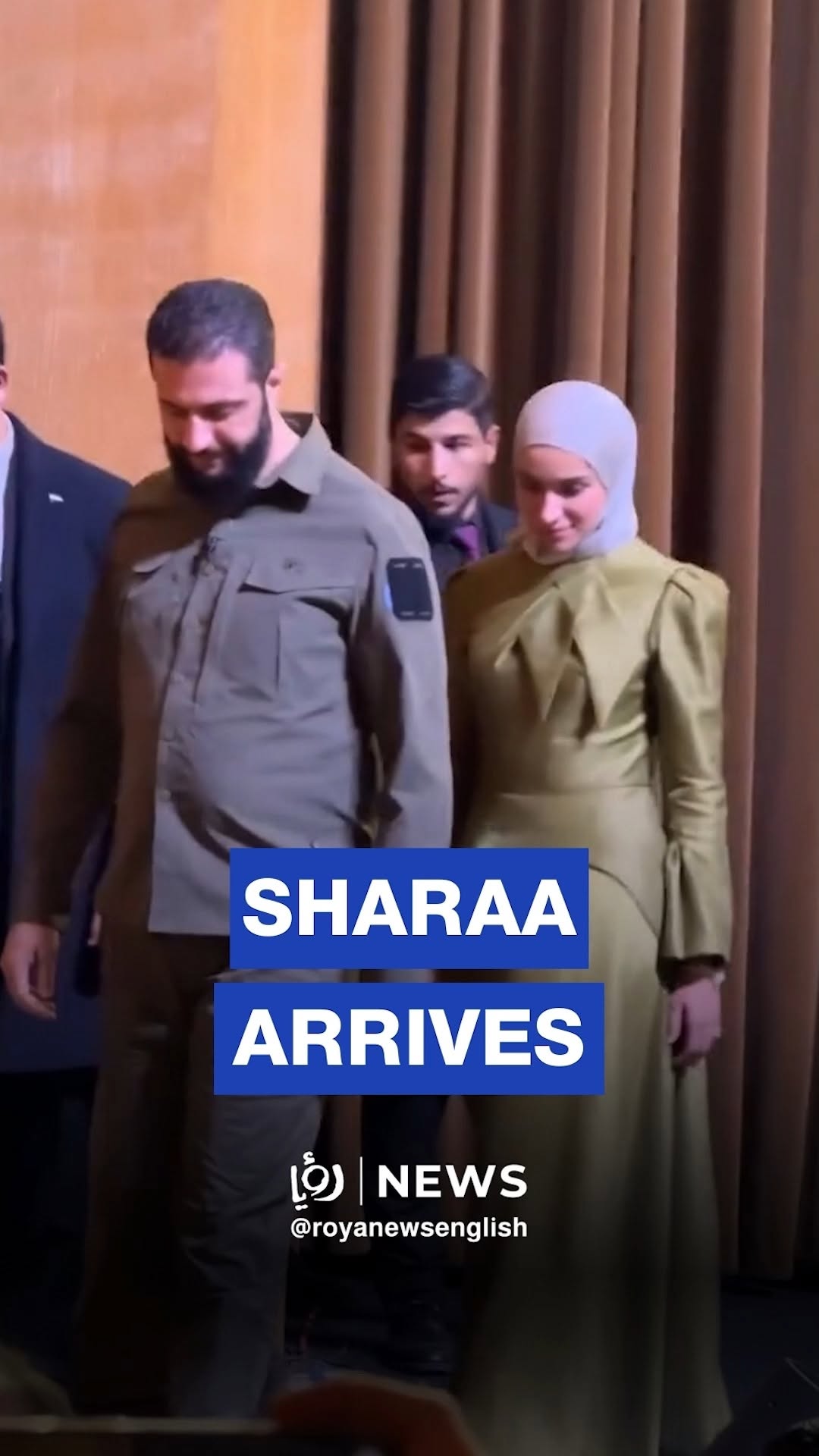 President Ahmed al-Sharaa and his wife arrive at the Conference Palace for Liberation Day celebrations