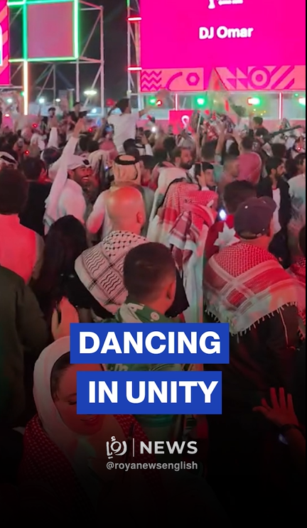 Jordanian, Saudi fans celebrate together after match, dancing in joy and unity