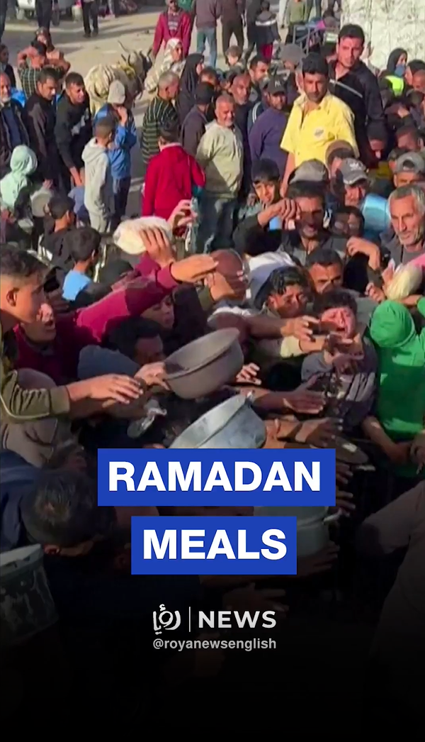 Palestinians line up for hot Ramadan meals in Gaza