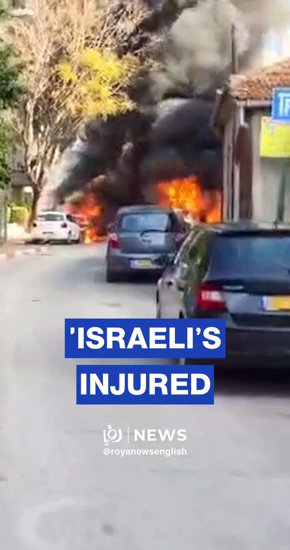 Vehicles in flames after Iranian missile attack on central 'Israel'