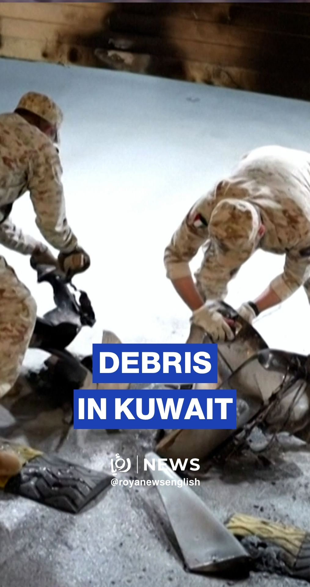 Kuwaiti army remove debris from intercepted drones and missiles