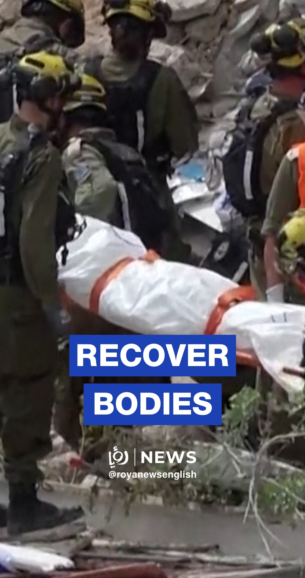 'Israeli' rescue teams recover bodies from site of Haifa strike