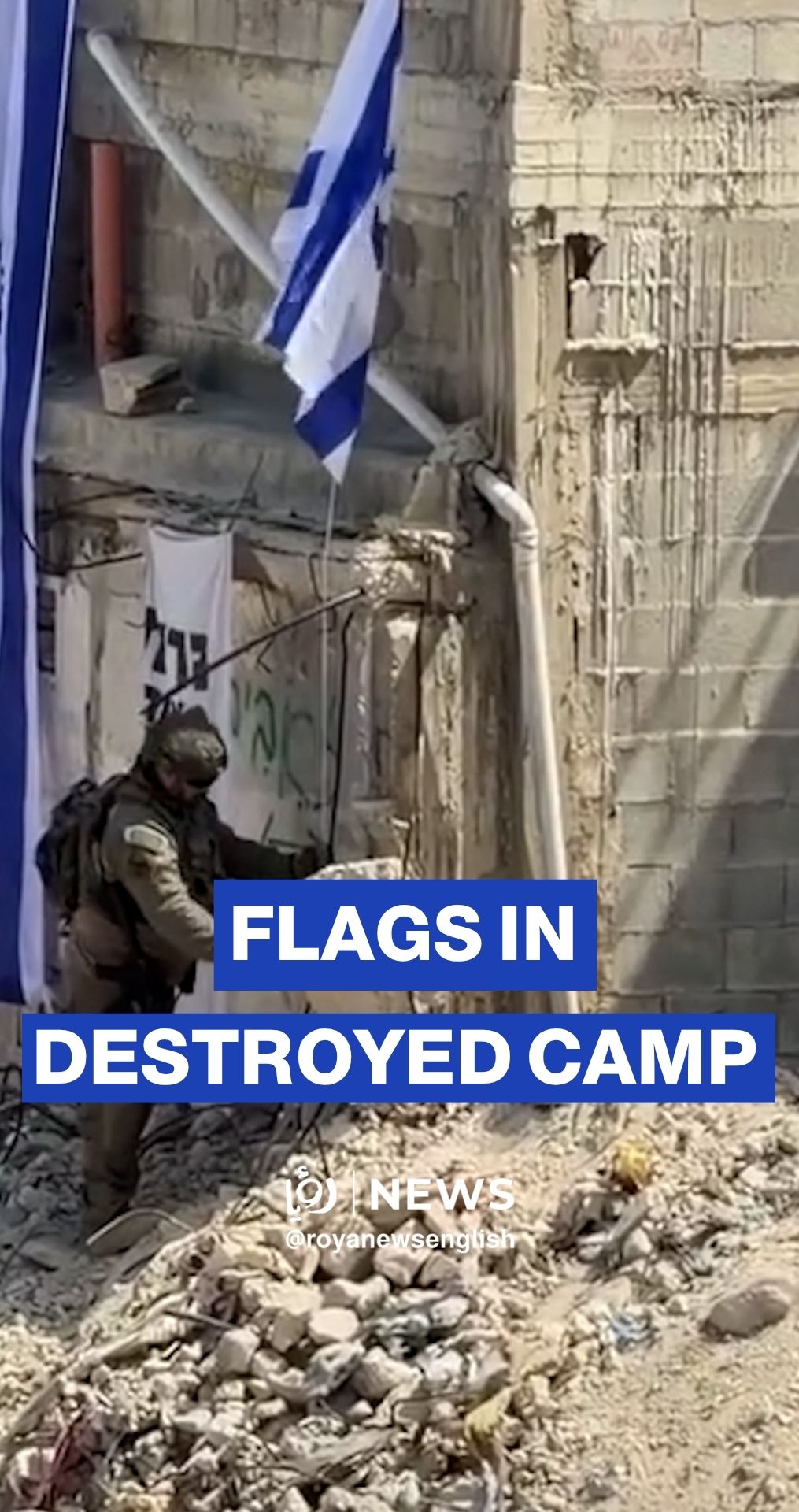 'Israeli' army raises flags in destroyed alleys of Tulkarm camp