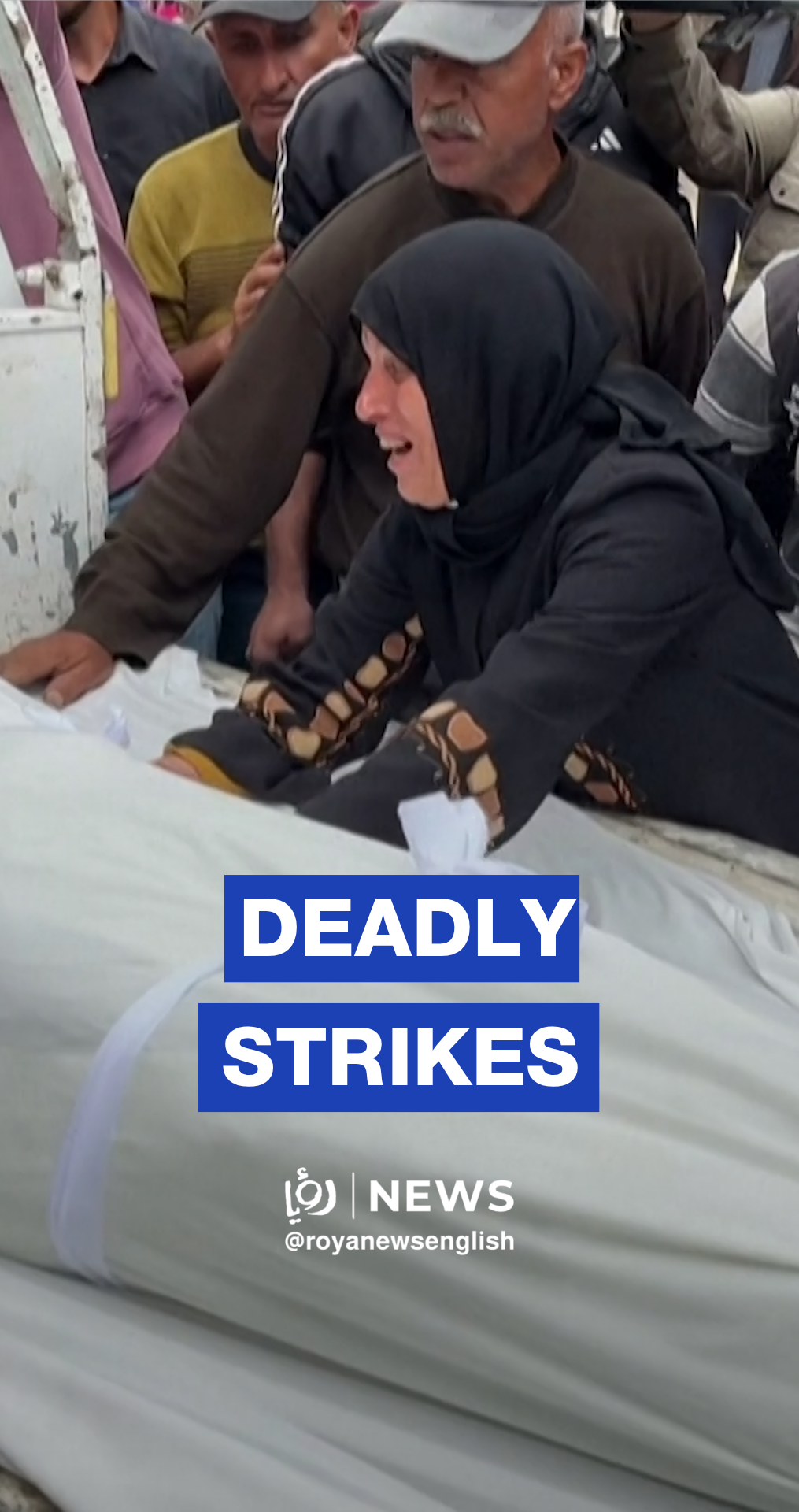 Palestinians mourn at Al-Shifa hospital after Gaza strikes