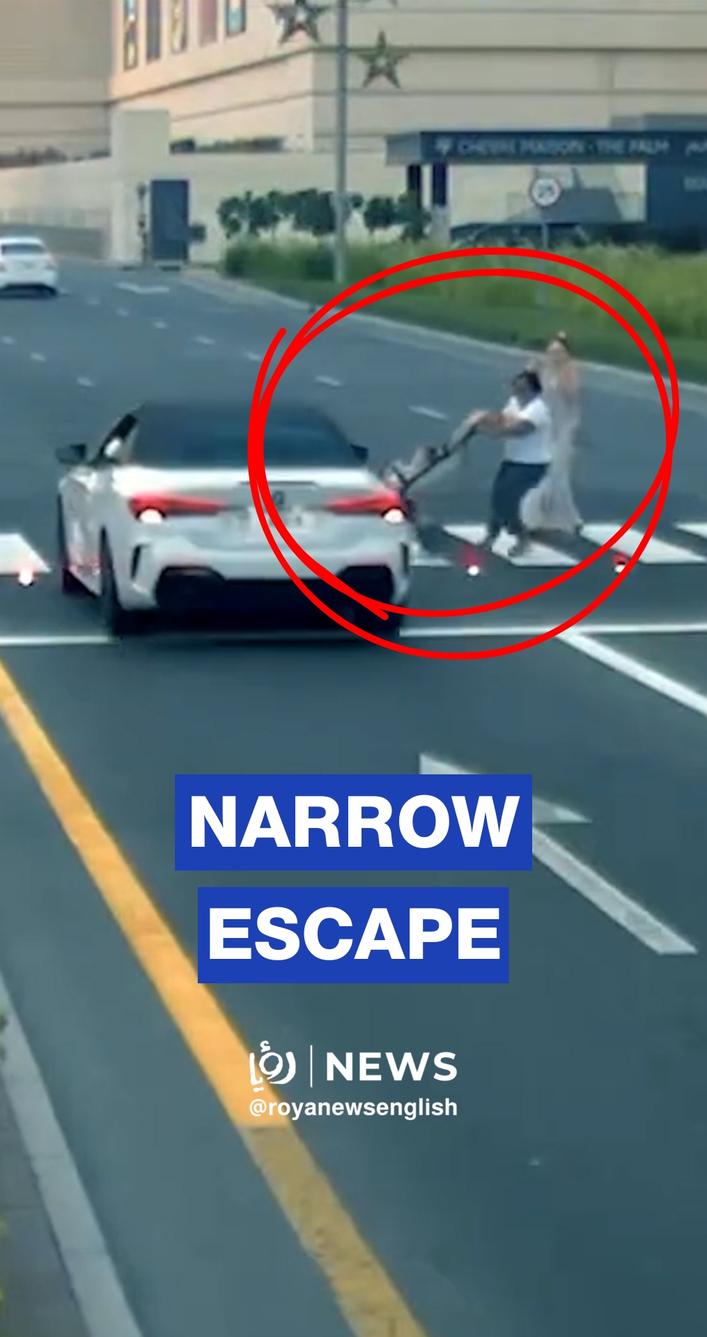 Dubai driver nearly hits family after running red light