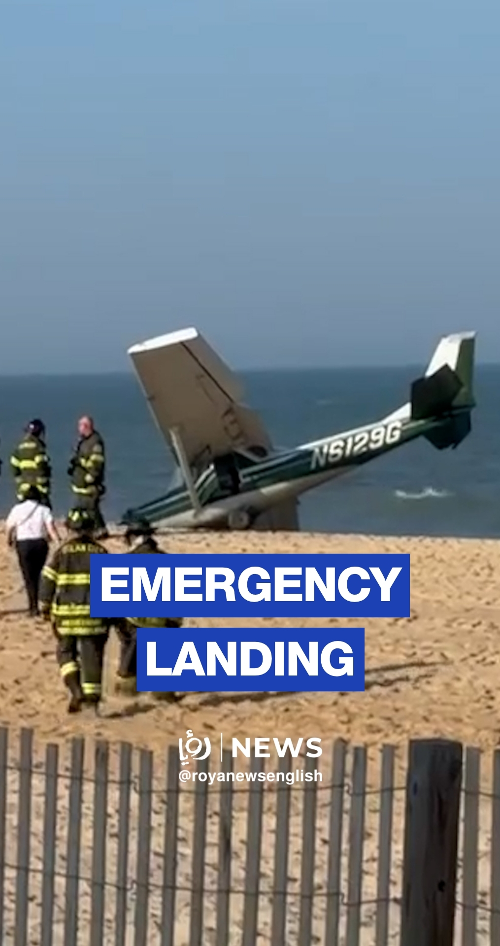 Small plane makes an emergency landing on a beach