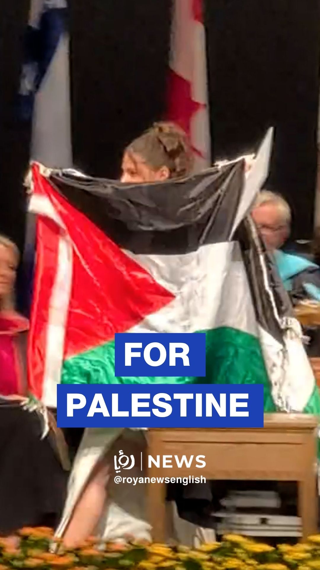 University graduate removed after raising Palestinian flag